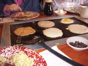Cooking pancakes at Old Spanish Sugar Mill Florida